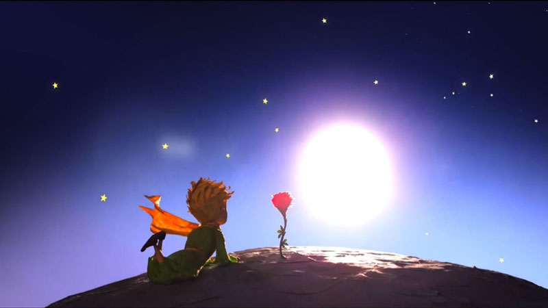 ο μικρός πρίγκιπας κοιτάζει το λουλούδι του πάνω στον πλανήτη του