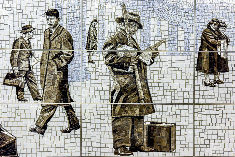 ζωγραφιά που απεικονίζει άντρες και γυναίκες να περπατούν